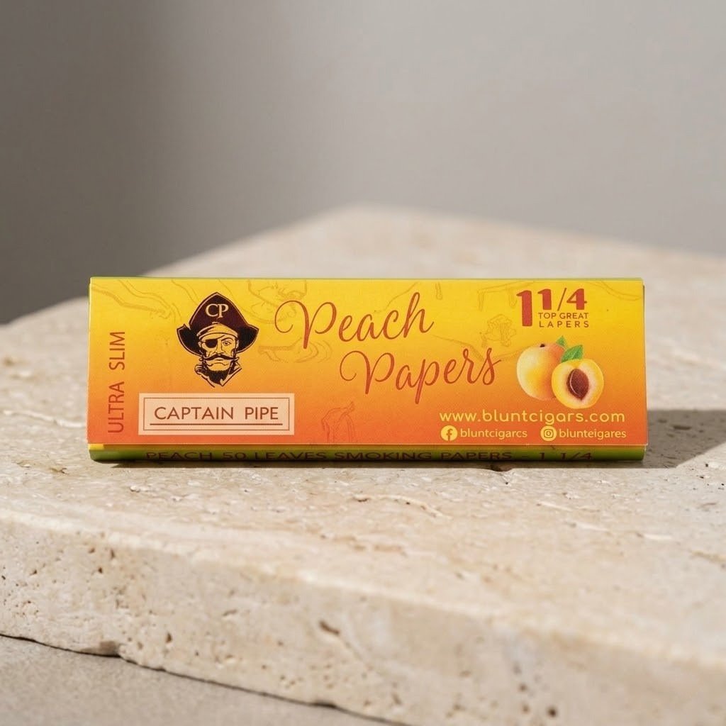 Cueros Papeles Captain Pipe Peach #9 en su librillo sobre piedra clara