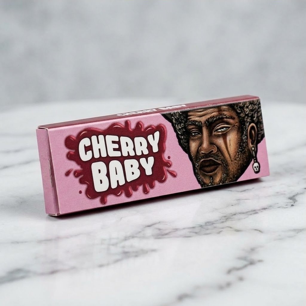 Cueros Papeles Lion Rolling Circus Cherry Baby #9 sobre una superficie de mármol blanco
